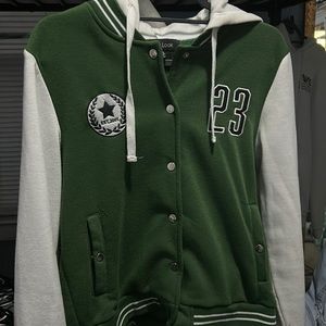 A green and white varsity Jacket from New Look brand, bought at a Rainbow store.